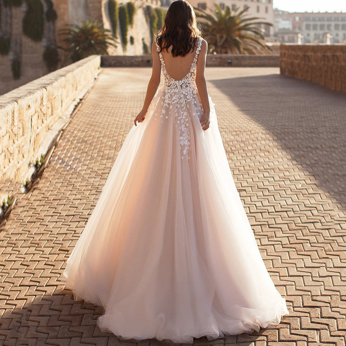 Embroidered Lace A – Line Wedding Dress with Deep V – Neck. luxury bridal gown by Bridal Boutique