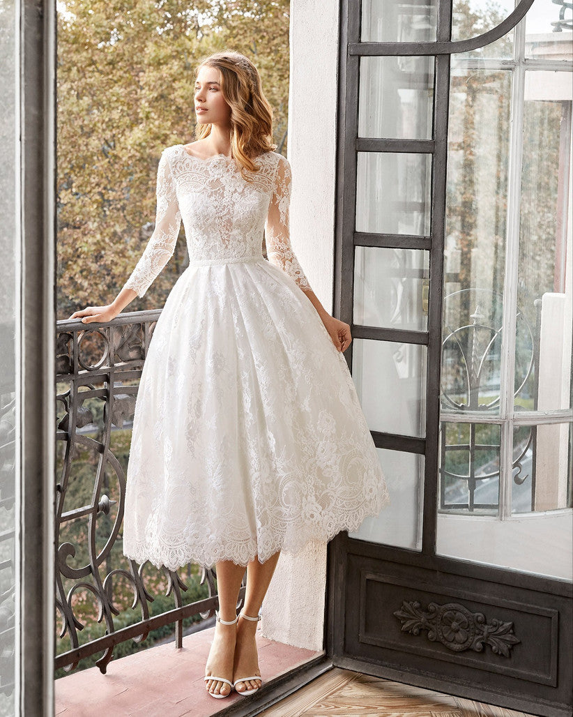 Vintage 1950s Long Sleeve Lace Tea-Length Wedding Dress with Low V-Back.