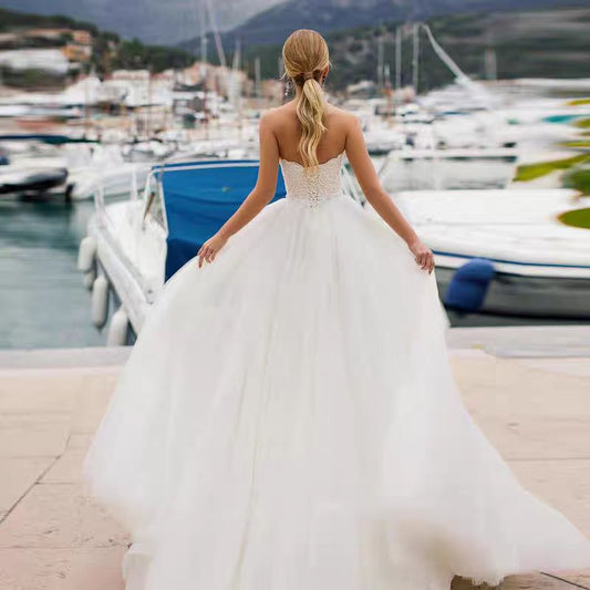 Modern One-Shoulder Satin Mermaid Wedding Dress with Draped Bodice.
