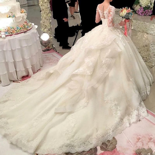 Royal Long Sleeve Lace Ball Gown - Elegant Princess Wedding Dress with Train.