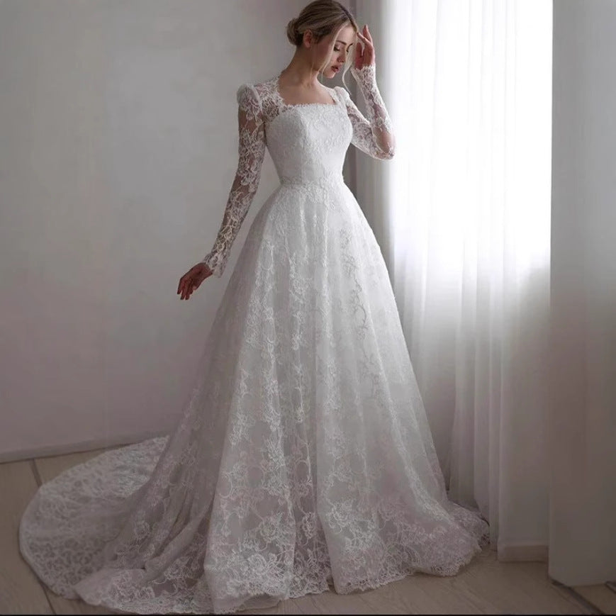 Plunging Sweetheart Mermaid Wedding Dress – Dramatic Tiered Ruffle Bridal Gown. luxury bridal gown by Bridal Boutique