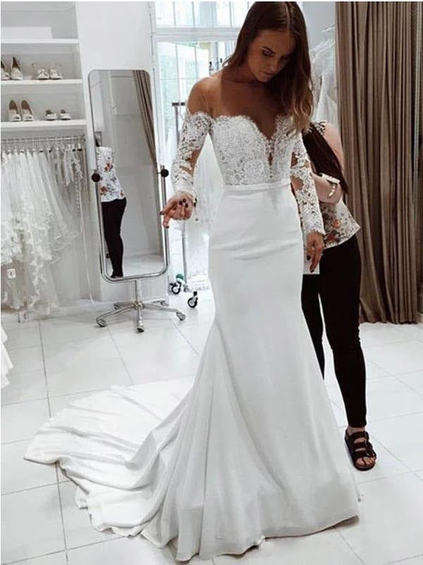 Deep V – Neck Chiffon A – Line Wedding Dress with Long Lace Sleeves. luxury bridal gown by Bridal Boutique