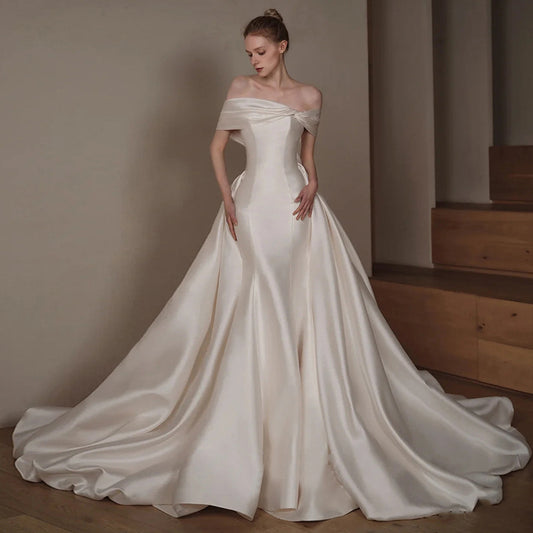 Satin Mermaid Wedding Dress with Detachable Overskirt – 2 – in – 1 Bridal Gown. luxury bridal gown by Bridal Boutique