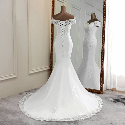 Boho Tiered Lace Wedding Dress - Long Bell Sleeve Bridal Gown with Train.