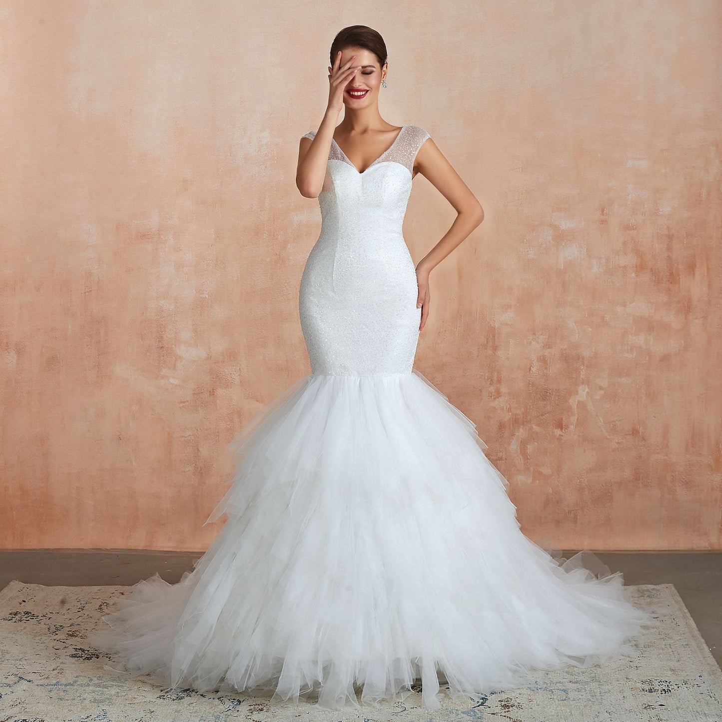 Dramatic Mermaid Wedding Dress with Ruffled Tulle Skirt & Corset Back.