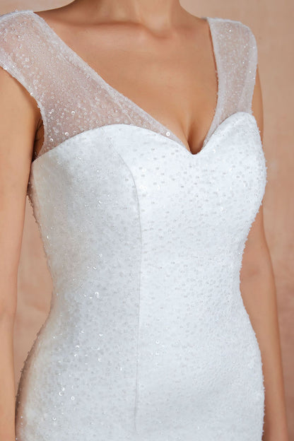 Dramatic Mermaid Wedding Dress with Ruffled Tulle Skirt & Corset Back.