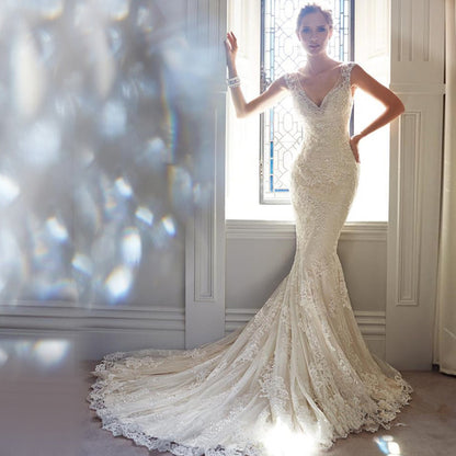 Elegant Lace Mermaid Wedding Dress with Illusion Button Back & Train.