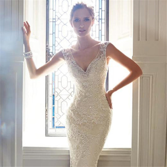 Elegant Lace Mermaid Wedding Dress with Illusion Button Back & Train.