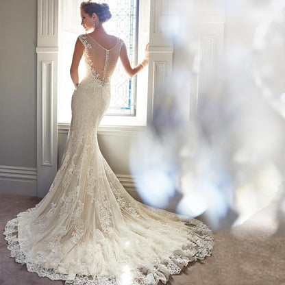 Elegant Lace Mermaid Wedding Dress with Illusion Button Back & Train.