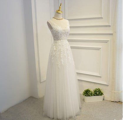Sleeveless White Evening Gown - Fitted High-Neck Wedding Dress with Lace Detail