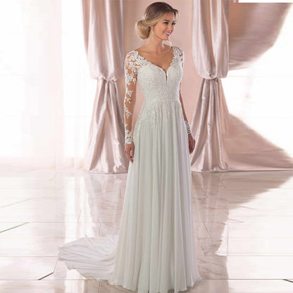 Elegant Lace Mermaid Wedding Dress with Sheer Illusion Back and Train.