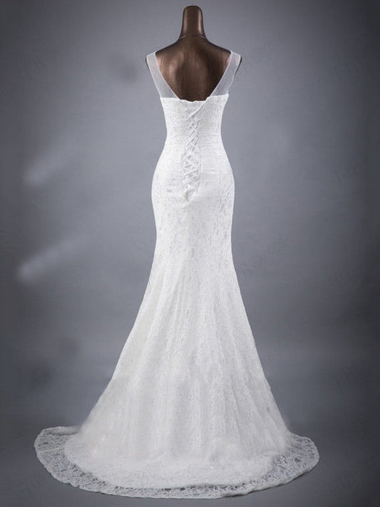 Elegant Lace Trumpet Wedding Dress with Illusion Neckline and Train.
