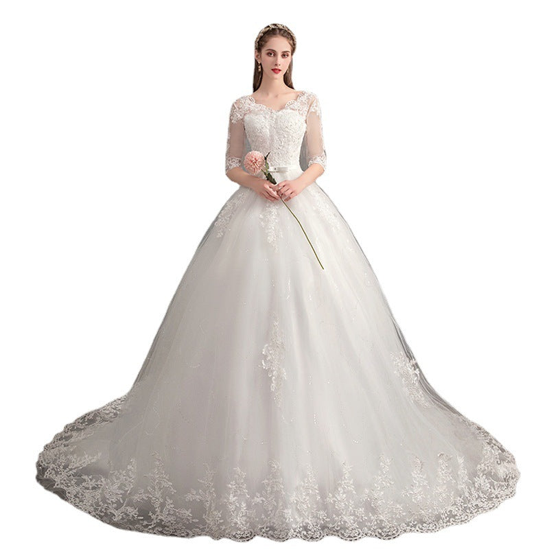 Romantic Floral Lace Appliqué A-Line Wedding Dress with Tulle Skirt.