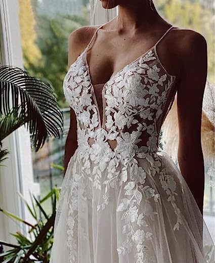 Floral Lace A-Line Wedding Dress - Romantic Deep V-Neck Bridal Gown with Straps.