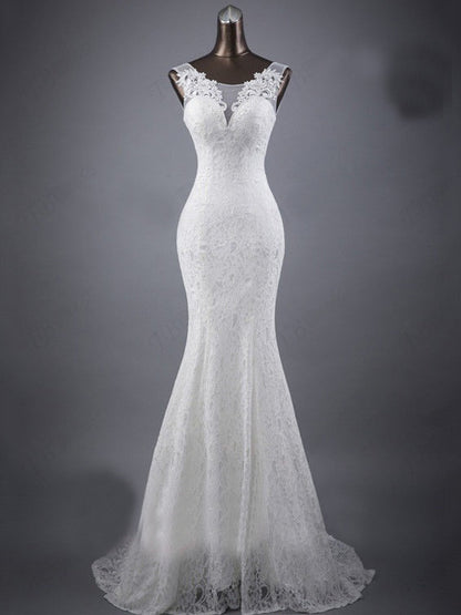 Elegant Lace Trumpet Wedding Dress with Illusion Neckline and Train.