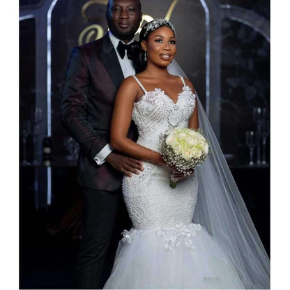 Luxury Beaded Lace Mermaid Wedding Dress with Dramatic Tulle Train.