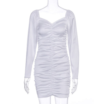 Low-rise pleated dress