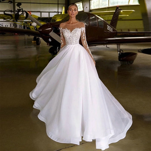 Off-Shoulder Embroidered Long Sleeve Wedding Dress with Train – Elegant Ball Gown Bridal Gown.