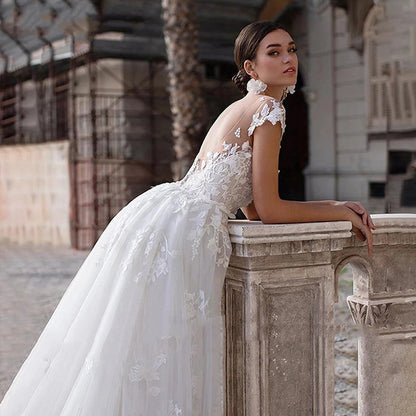 2-in-1 Lace Mermaid Wedding Dress with Detachable Tulle Overskirt.
