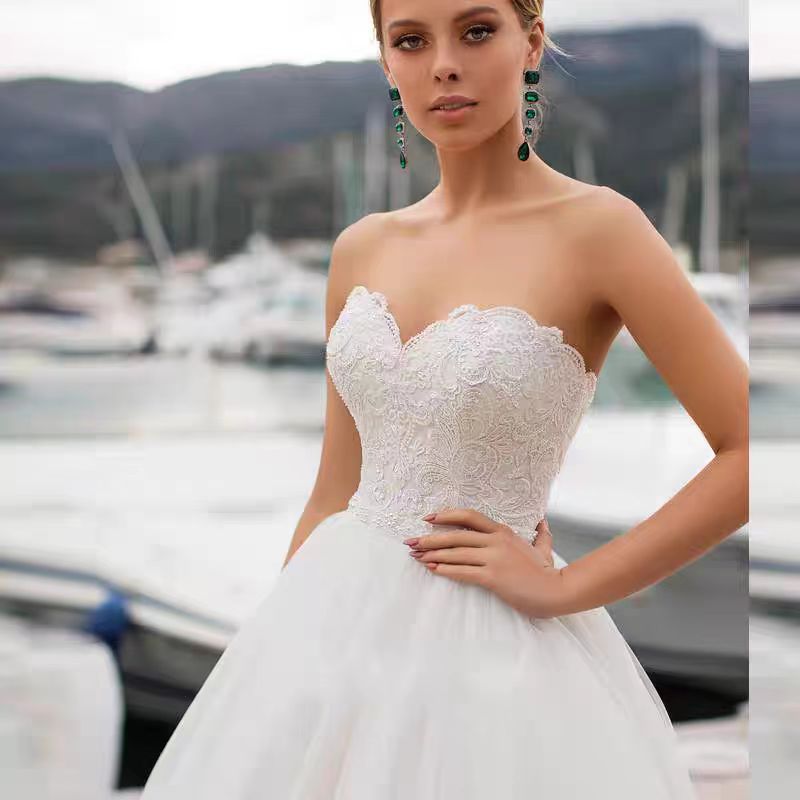 Modern One-Shoulder Satin Mermaid Wedding Dress with Draped Bodice.