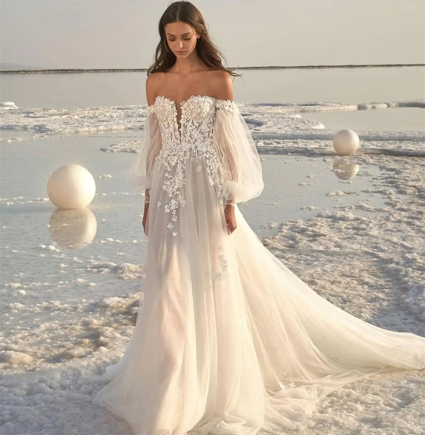 Boho Off-the-Shoulder Tulle Wedding Dress with Detachable Puff Sleeves.