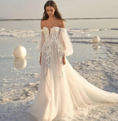 Boho Off-the-Shoulder Tulle Wedding Dress with Detachable Puff Sleeves.