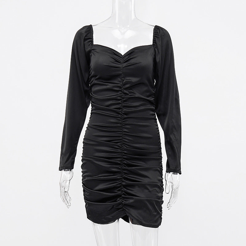 Low-rise pleated dress