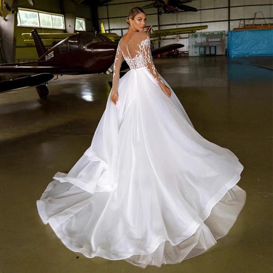 Off-Shoulder Embroidered Long Sleeve Wedding Dress with Train – Elegant Ball Gown Bridal Gown.