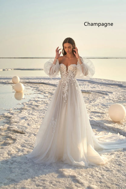 Boho Off-the-Shoulder Tulle Wedding Dress with Detachable Puff Sleeves.