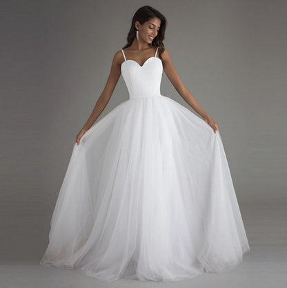 Simple Sweetheart Tulle A-Line Wedding Dress with High-Low Train.