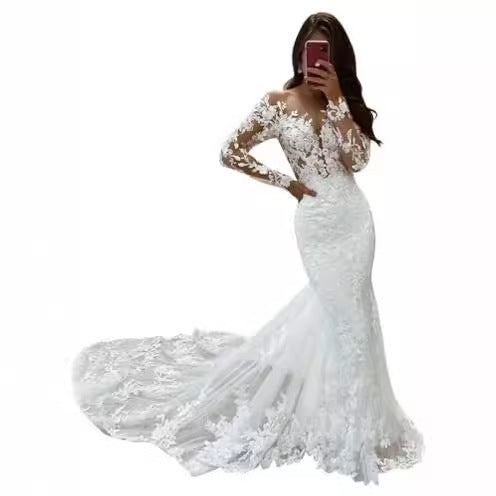 Long Sleeve Lace Mermaid Wedding Dress with Deep V-Neck and Train.