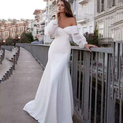 Off-the-Shoulder Satin Mermaid Wedding Dress with Chiffon Bishop Sleeves.