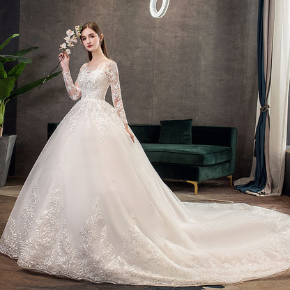 Long Sleeve Lace Backless Wedding Dress with Train – Elegant Ball Gown Bridal Gown.