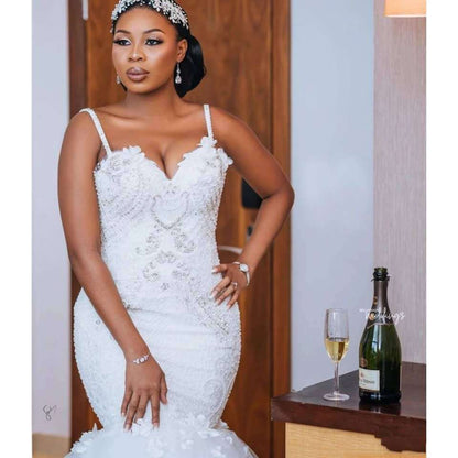 Luxury Beaded Lace Mermaid Wedding Dress with Dramatic Tulle Train.