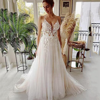 Floral Lace A-Line Wedding Dress - Romantic Deep V-Neck Bridal Gown with Straps.