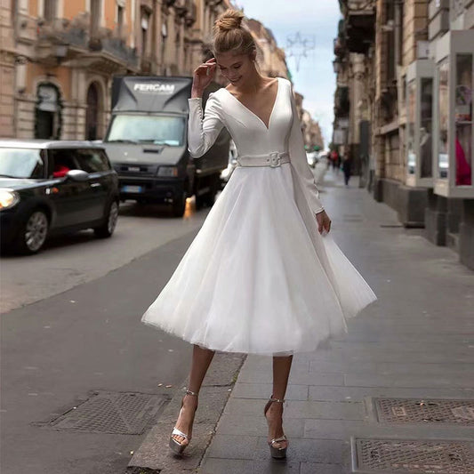Boho Off-the-Shoulder Long Sleeve Tulle Wedding Dress with Lace Bodice.