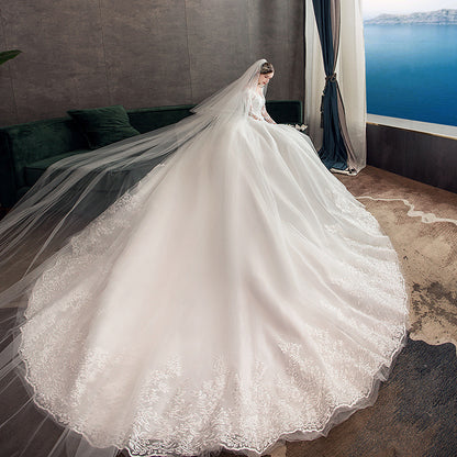 Long Sleeve Lace Backless Wedding Dress with Train – Elegant Ball Gown Bridal Gown.