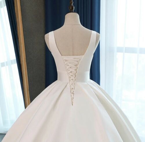 Classic Satin Ball Gown Wedding Dress with Plunging V-Neckline.