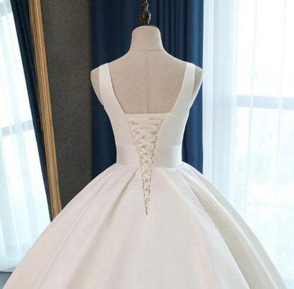 Classic Satin Ball Gown Wedding Dress with Plunging V-Neckline.