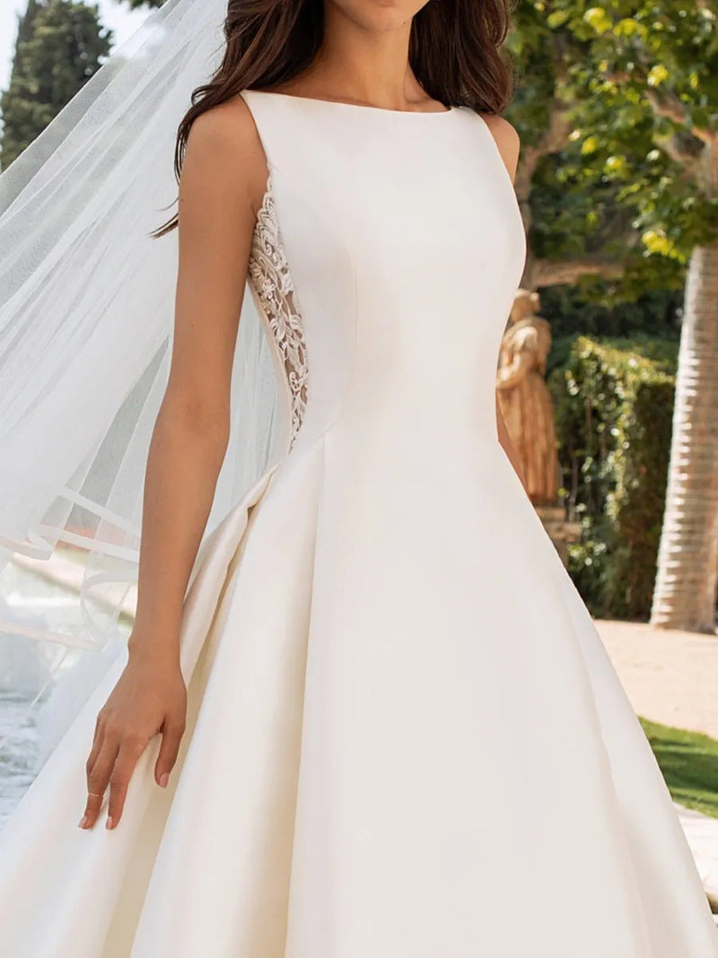 Elegant Satin A-Line Wedding Dress with Dramatic Illusion Lace Back.