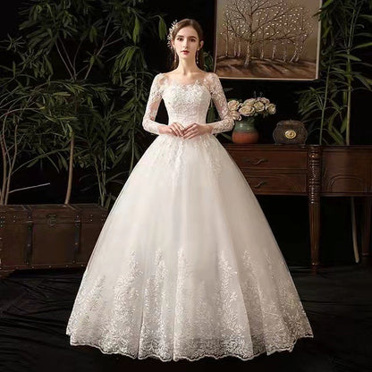 Long Sleeve Lace Backless Wedding Dress with Train – Elegant Ball Gown Bridal Gown.