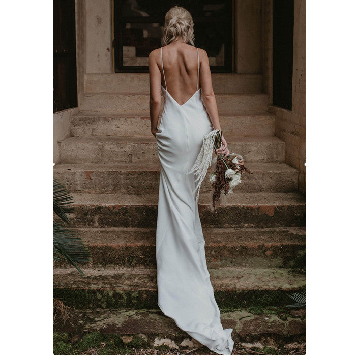 Minimalist Satin Slip Wedding Dress | Low Back Bridal Gown with Train. luxury bridal gown by Bridal Boutique