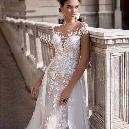 2-in-1 Lace Mermaid Wedding Dress with Detachable Tulle Overskirt.