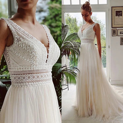Ivory A-Line Chiffon Wedding Dress with V-Neck and Long Sleeves.