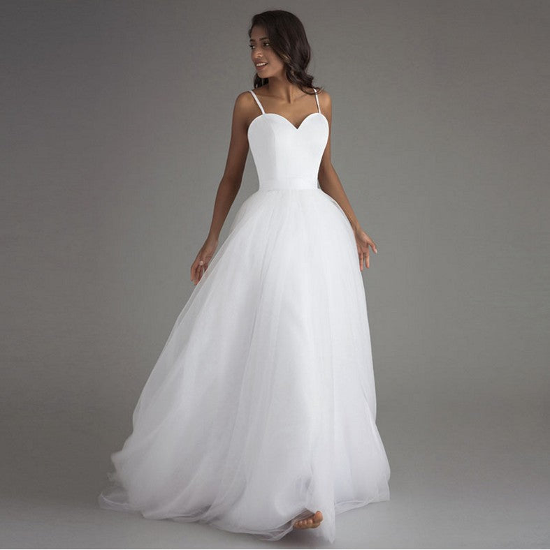 Simple Sweetheart Tulle A-Line Wedding Dress with High-Low Train.