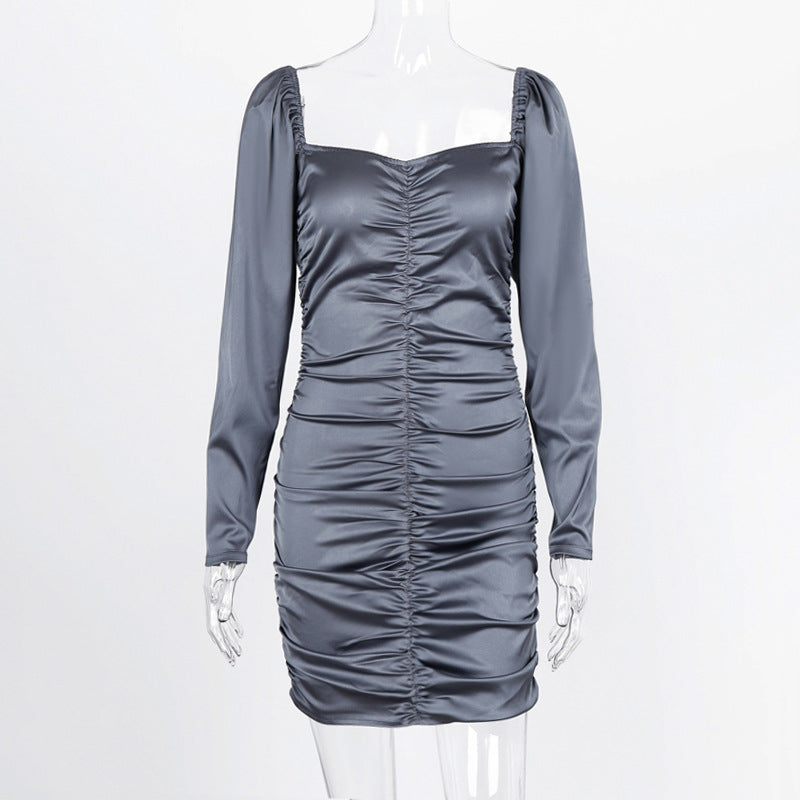 Low-rise pleated dress