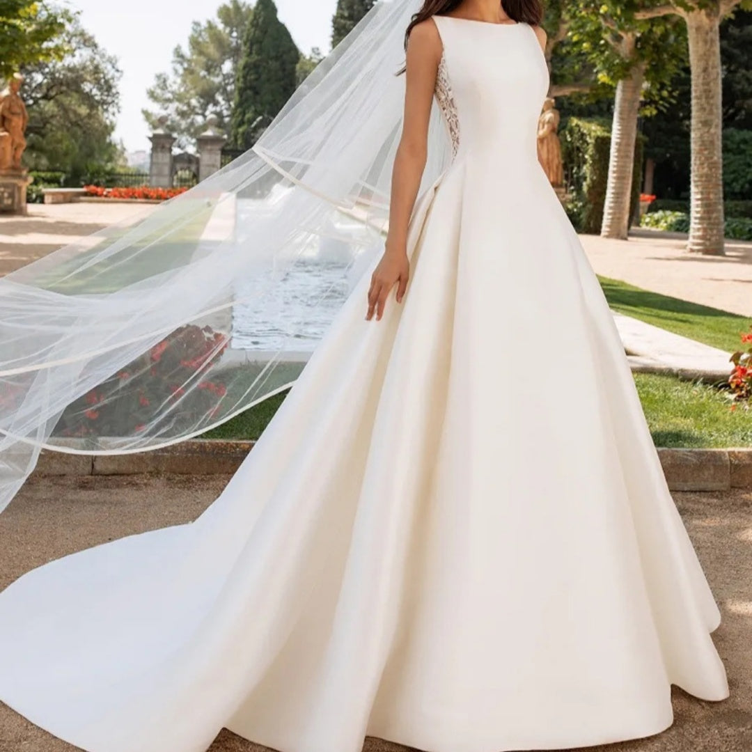 Elegant Satin A-Line Wedding Dress with Dramatic Illusion Lace Back.