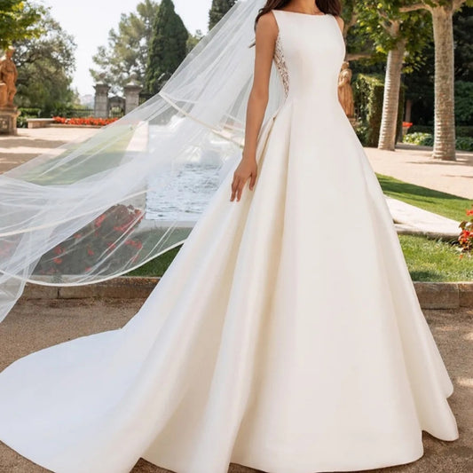 Elegant Satin A-Line Wedding Dress with Dramatic Illusion Lace Back.