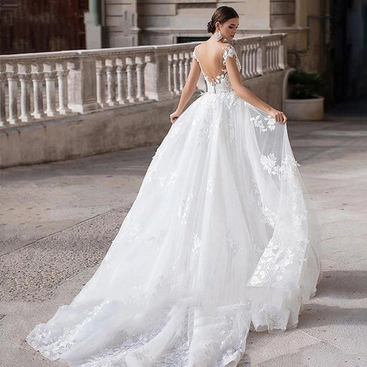 2-in-1 Lace Mermaid Wedding Dress with Detachable Tulle Overskirt.
