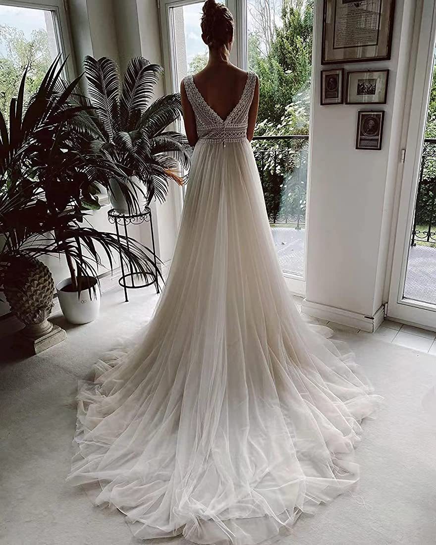 Ivory A-Line Chiffon Wedding Dress with V-Neck and Long Sleeves.